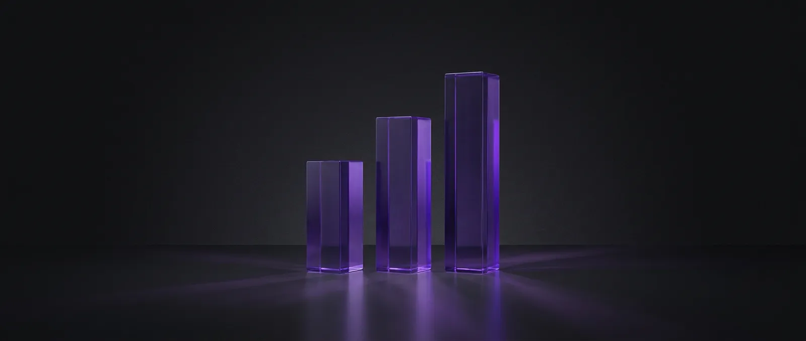 Abstract illustration of three glass pricing tiers representing website cost bands